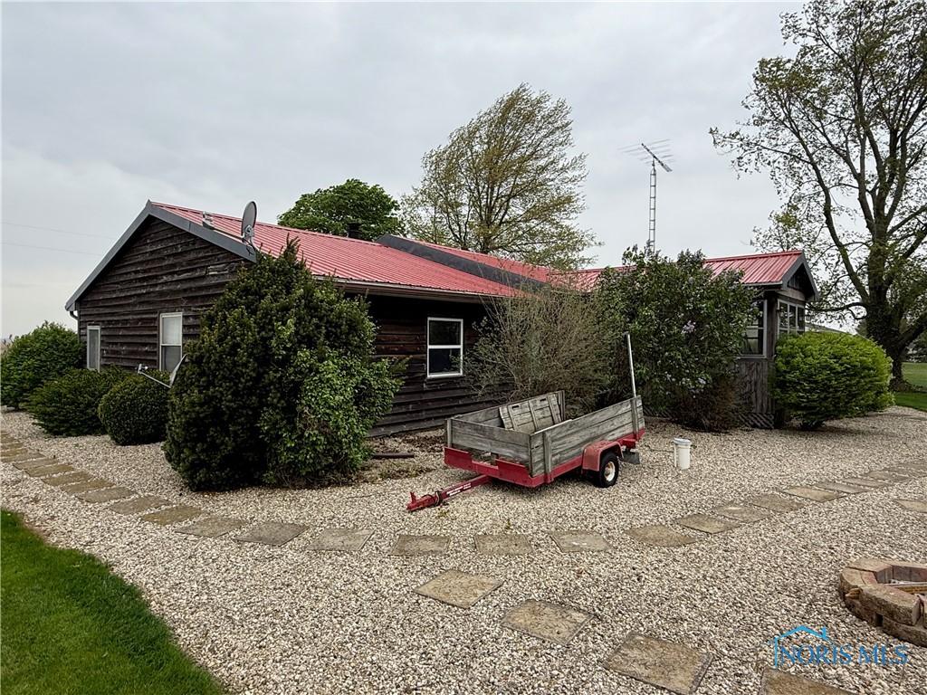 12401 County Highway 110, Upper Sandusky, OH 43351 - view of side of home featuring a metal roof