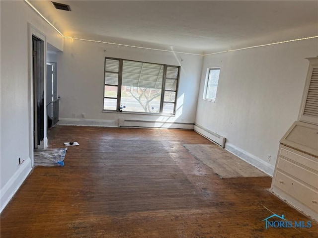 4625 Lewis Ave, Toledo, OH 43612 - empty room featuring wood finished floors and baseboard heating