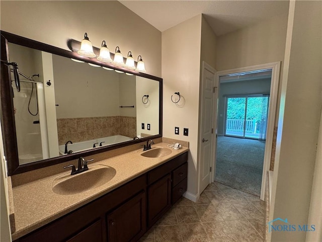 5346 Palisades Dr, Sylvania, OH 43560 - bathroom featuring a bath, double vanity, tile patterned flooring, and a shower