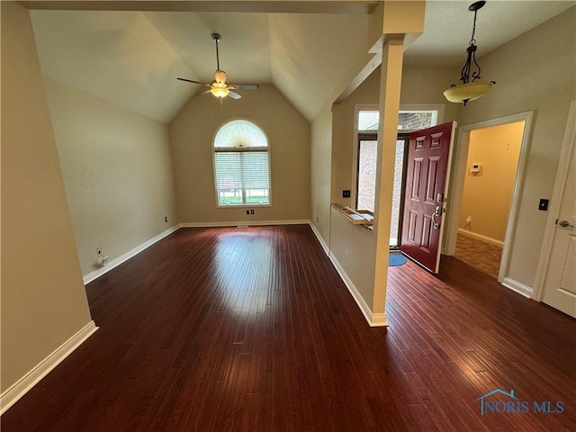 5346 Palisades Dr, Sylvania, OH 43560 - foyer with a ceiling fan, dark wood finished floors, lofted ceiling, and decorative columns