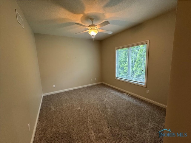 5346 Palisades Dr, Sylvania, OH 43560 - carpeted empty room featuring a ceiling fan and a textured ceiling