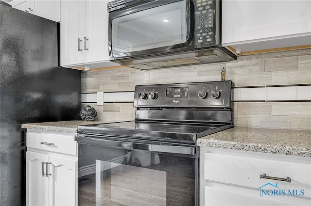 11 Meadowpond Dr, Perrysburg, OH 43551 - kitchen with black appliances, tasteful backsplash, white cabinetry, and light stone countertops
