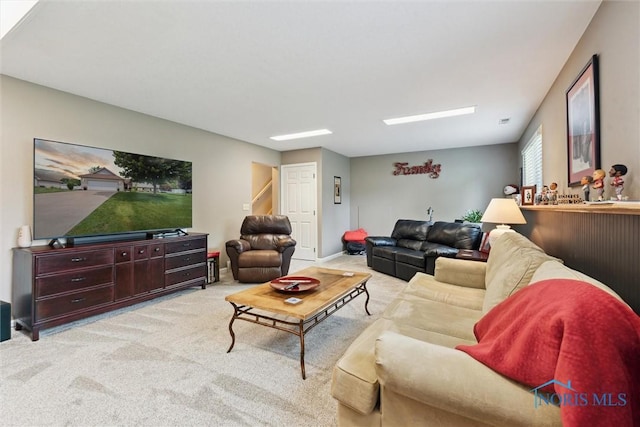 735 Hemlock St, Wauseon, OH 43567 - living area featuring light colored carpet