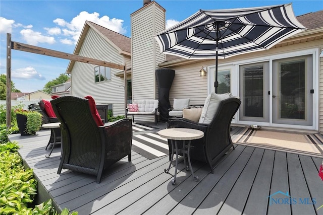 735 Hemlock St, Wauseon, OH 43567 - wooden terrace featuring outdoor lounge area