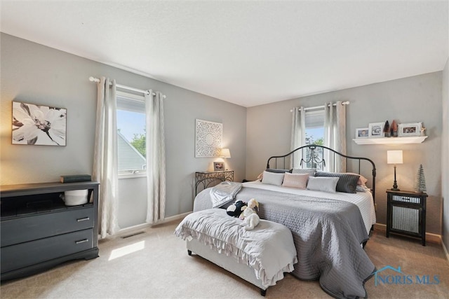 735 Hemlock St, Wauseon, OH 43567 - carpeted bedroom featuring baseboards