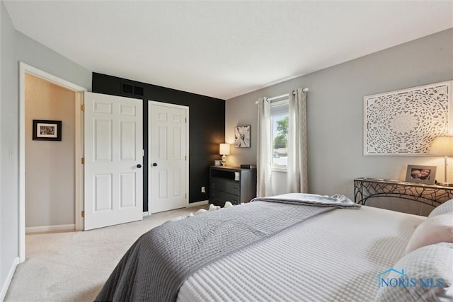 735 Hemlock St, Wauseon, OH 43567 - carpeted bedroom with baseboards and a closet