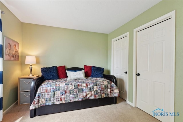735 Hemlock St, Wauseon, OH 43567 - carpeted bedroom with baseboards
