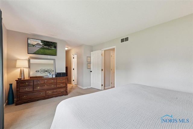 735 Hemlock St, Wauseon, OH 43567 - carpeted bedroom with baseboards