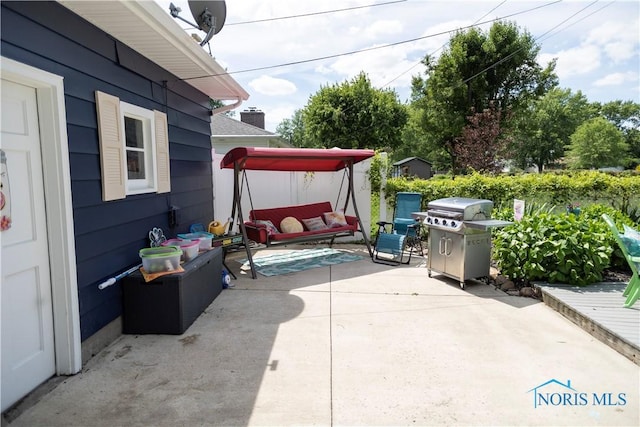 1118 5th St, Findlay, OH 45840 - view of patio / terrace featuring an outdoor living space and a grill