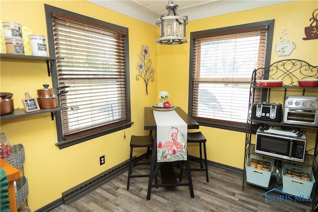1118 5th St, Findlay, OH 45840 - dining room featuring wood finished floors and healthy amount of natural light
