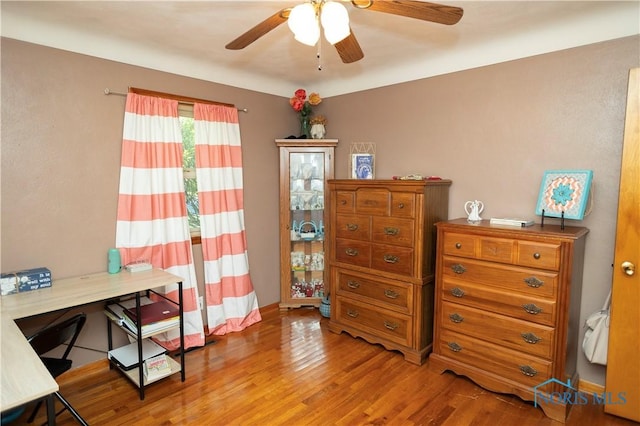 1118 5th St, Findlay, OH 45840 - bedroom with wood finished floors and a desk
