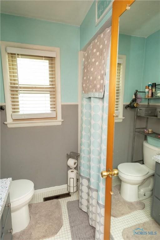 1118 5th St, Findlay, OH 45840 - bathroom featuring vanity and curtained shower