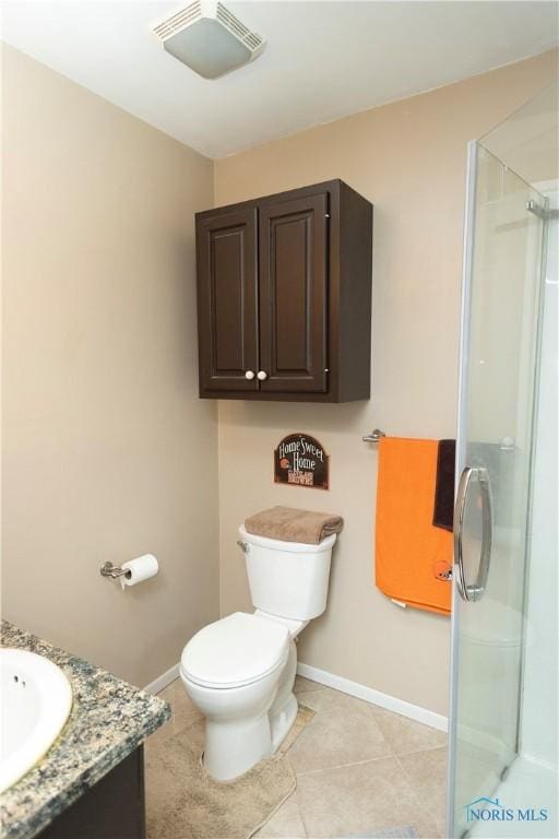 1118 5th St, Findlay, OH 45840 - bathroom featuring vanity, a shower stall, and tile patterned floors