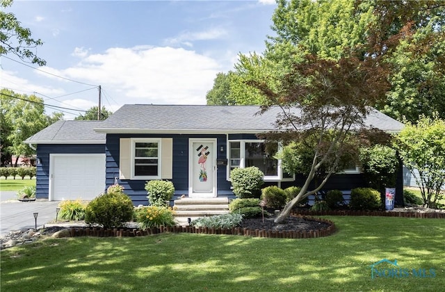 1118 5th St, Findlay, OH 45840 - view of front of house with a garage, a front yard, concrete driveway, and a shingled roof