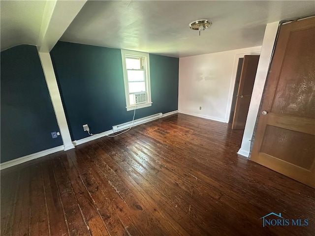 228 Harris St, Elmore, OH 43416 - spare room featuring baseboard heating, hardwood / wood-style floors, and cooling unit
