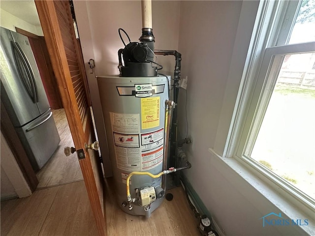 228 Harris St, Elmore, OH 43416 - utility room with water heater