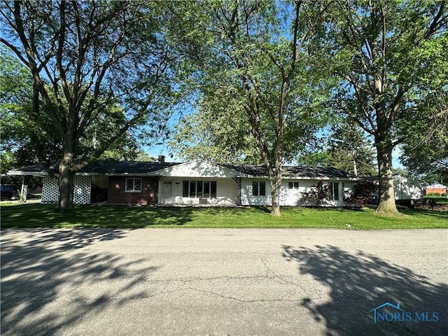 101 Maplewood Dr, Pandora, OH 45877 - single story home featuring a front yard