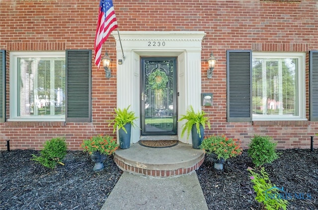 2230 Middlesex Dr, Toledo, OH 43606 - view of exterior entry featuring brick siding