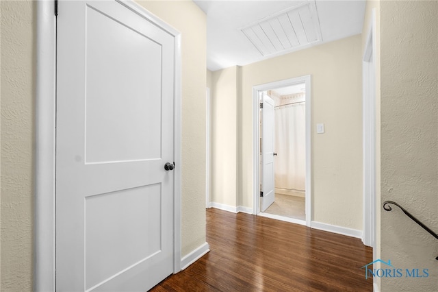 2230 Middlesex Dr, Toledo, OH 43606 - corridor featuring dark wood-style flooring and a textured wall