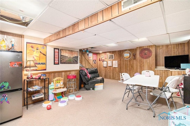 2204 Longport Dr, Maumee, OH 43537 - rec room with a drop ceiling, wooden walls, and carpet