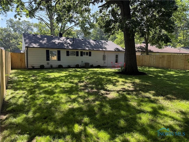 3209 Romaker Rd, Toledo, OH 43615 - rear view of property with a fenced backyard