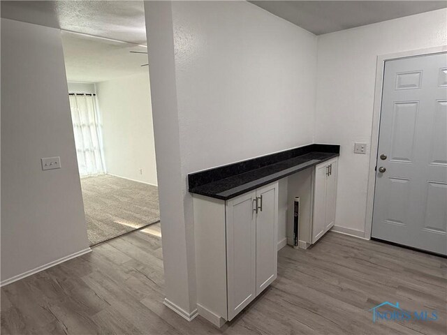 3209 Romaker Rd, Toledo, OH 43615 - washroom featuring wood finished floors and baseboards