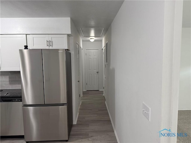 3209 Romaker Rd, Toledo, OH 43615 - corridor featuring attic access and light wood finished floors