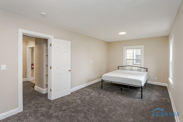 2529 Foraker Ave, Toledo, OH 43609 - carpeted bedroom with baseboards