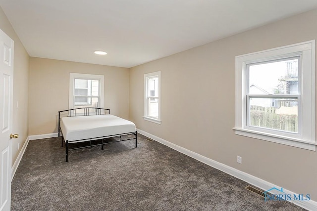 2529 Foraker Ave, Toledo, OH 43609 - carpeted bedroom featuring baseboards