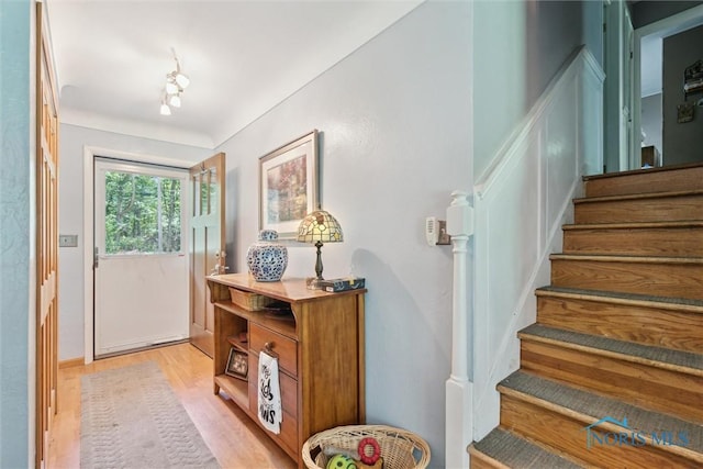 7948 Holstein Rd, Toledo, OH 43617 - foyer entrance featuring stairway and light wood-type flooring