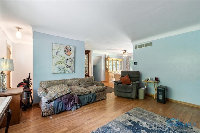 7948 Holstein Rd, Toledo, OH 43617 - living area featuring wood finished floors and a ceiling fan