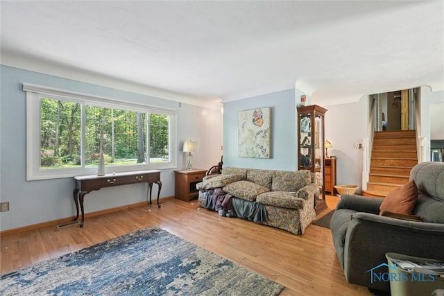 7948 Holstein Rd, Toledo, OH 43617 - living area with wood finished floors and stairway