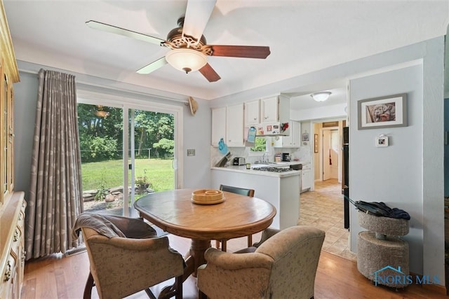 7948 Holstein Rd, Toledo, OH 43617 - dining space featuring a ceiling fan