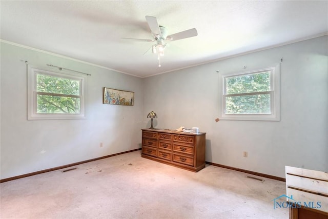 7948 Holstein Rd, Toledo, OH 43617 - bedroom featuring multiple windows, crown molding, carpet, and a ceiling fan