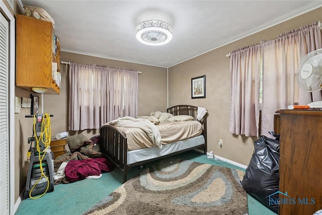 7948 Holstein Rd, Toledo, OH 43617 - carpeted bedroom featuring baseboards
