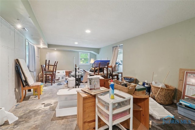 7948 Holstein Rd, Toledo, OH 43617 - living area featuring unfinished concrete flooring