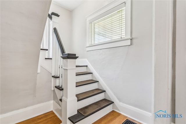 1022 E Sandusky St, Findlay, OH 45840 - staircase featuring wood finished floors