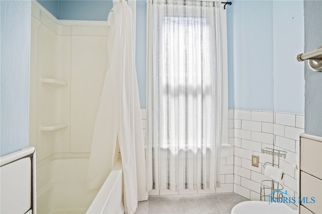 1022 E Sandusky St, Findlay, OH 45840 - full bathroom featuring shower / bath combo with shower curtain and tile patterned floors