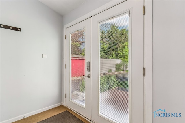 1022 E Sandusky St, Findlay, OH 45840 - doorway featuring french doors and carpet flooring