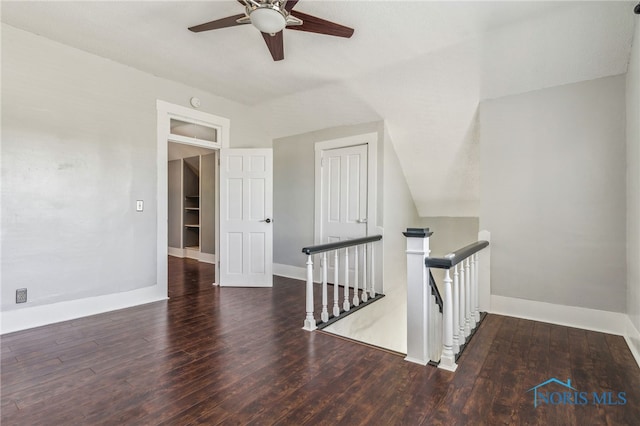 1022 E Sandusky St, Findlay, OH 45840 - hallway featuring an upstairs landing, wood finished floors, and vaulted ceiling