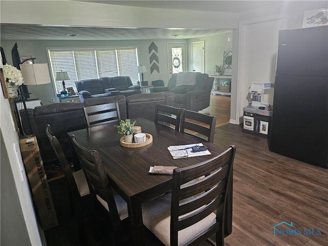 13876 Kay St, Paulding, OH 45879 - dining area with dark wood finished floors