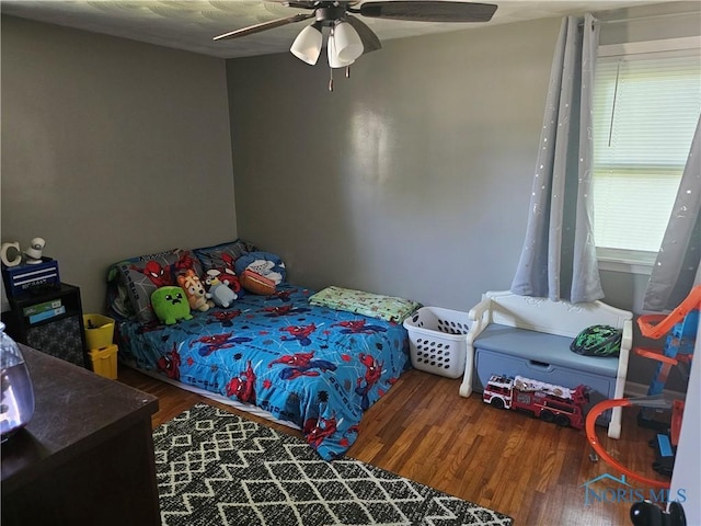 13876 Kay St, Paulding, OH 45879 - bedroom with wood finished floors and ceiling fan