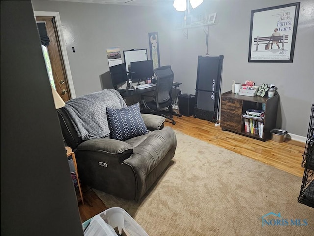 13876 Kay St, Paulding, OH 45879 - living area featuring wood finished floors, an office area, and a ceiling fan