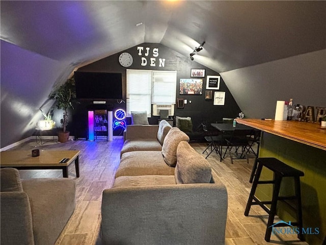 4544 Commonwealth Ave, Toledo, OH 43612 - home theater room with vaulted ceiling and wood finished floors
