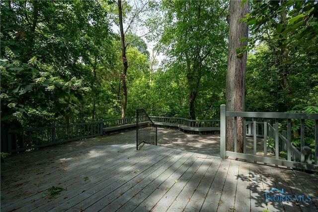 5301 River Oaks Ct, Sylvania, OH 43560 - wooden deck with a forest view