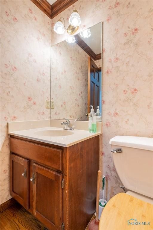 5301 River Oaks Ct, Sylvania, OH 43560 - half bathroom featuring wallpapered walls, vanity, and crown molding
