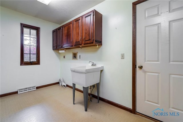 5301 River Oaks Ct, Sylvania, OH 43560 - laundry room featuring washer hookup, cabinet space, and electric dryer hookup