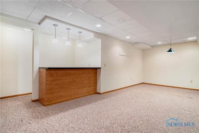 5301 River Oaks Ct, Sylvania, OH 43560 - empty room featuring carpet, a drop ceiling, bar area, and recessed lighting