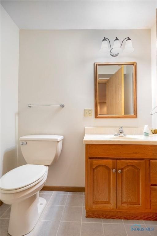 5301 River Oaks Ct, Sylvania, OH 43560 - half bathroom featuring vanity and tile patterned floors