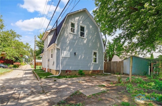 58 Greenwood Ave, Toledo, OH 43605 - view of side of home featuring a gambrel roof